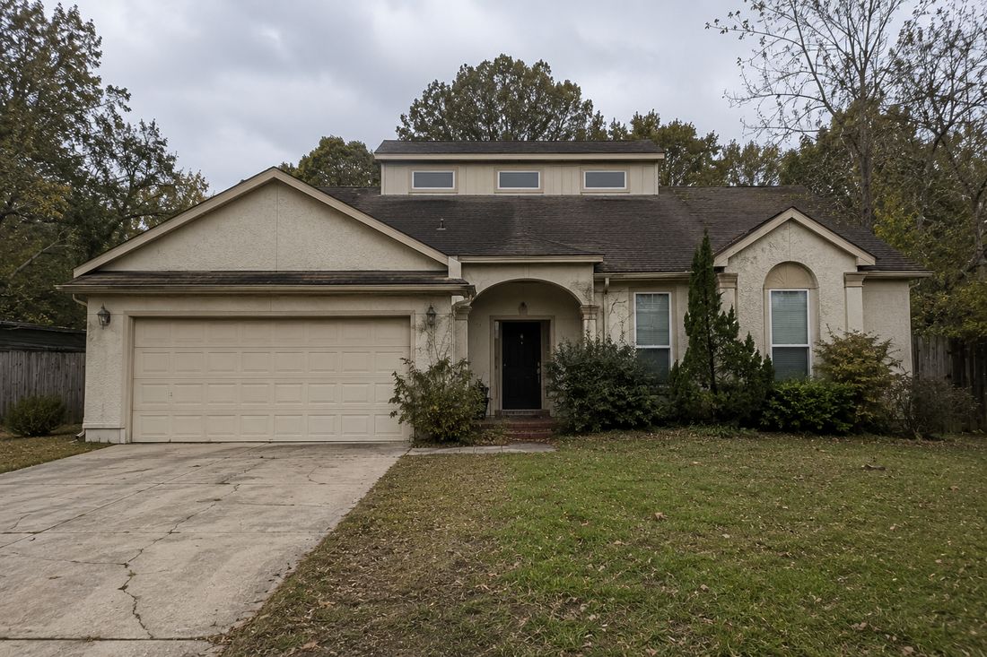 A ranch home with a two-car garage