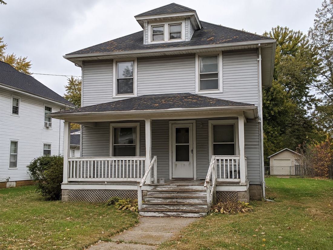 A two-story craftsman with a front porch