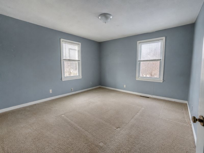 An emptied bedroom, ready for what comes next