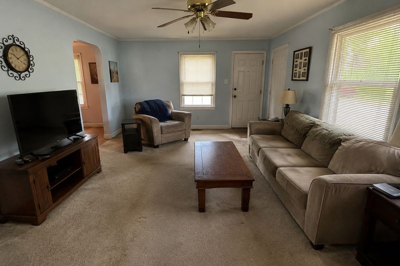 A lived-in living room, the rental as it stands