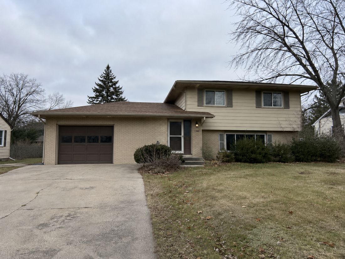 A split-level family home with a garage